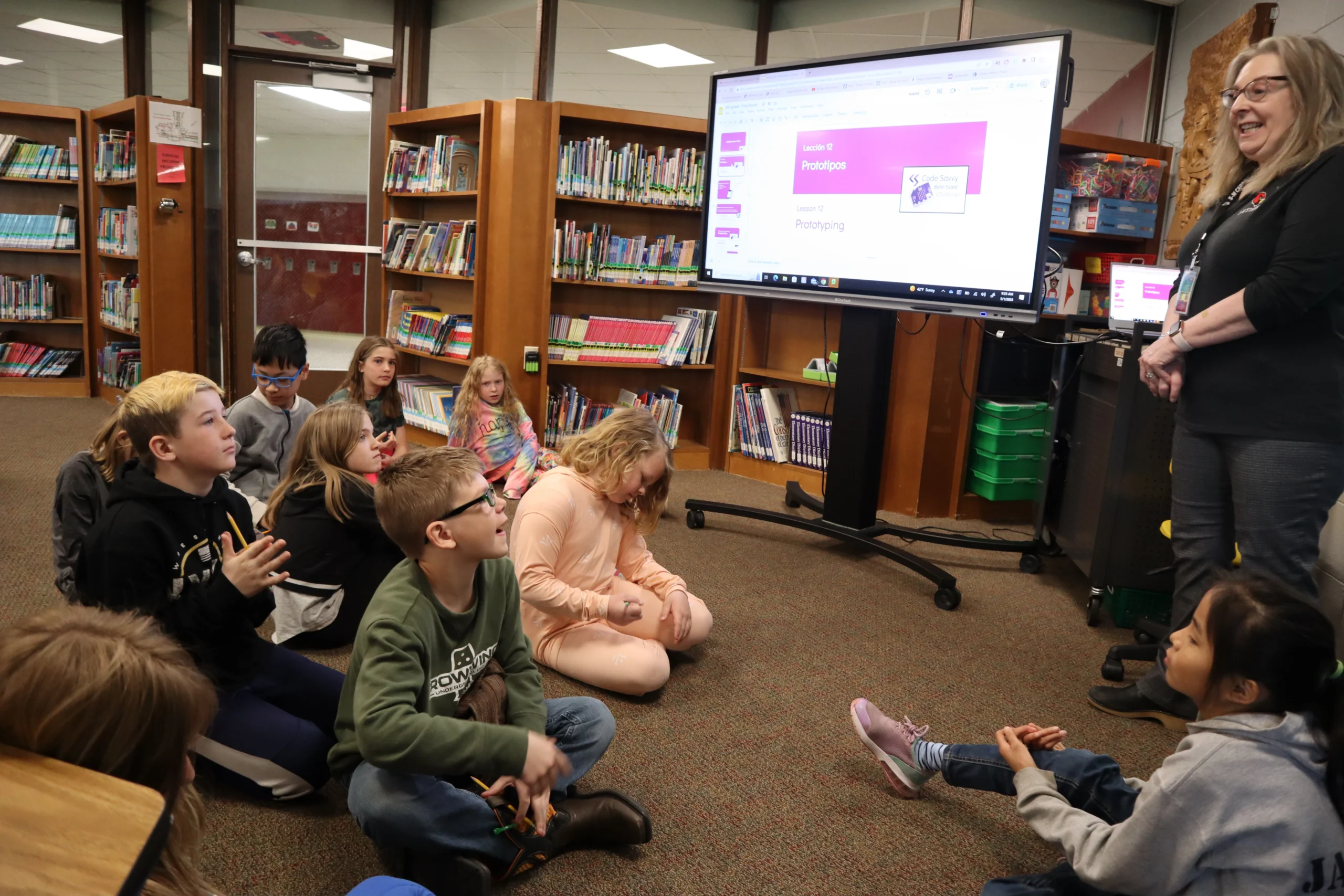 Teacher presenting Code Savvy curriculum to students