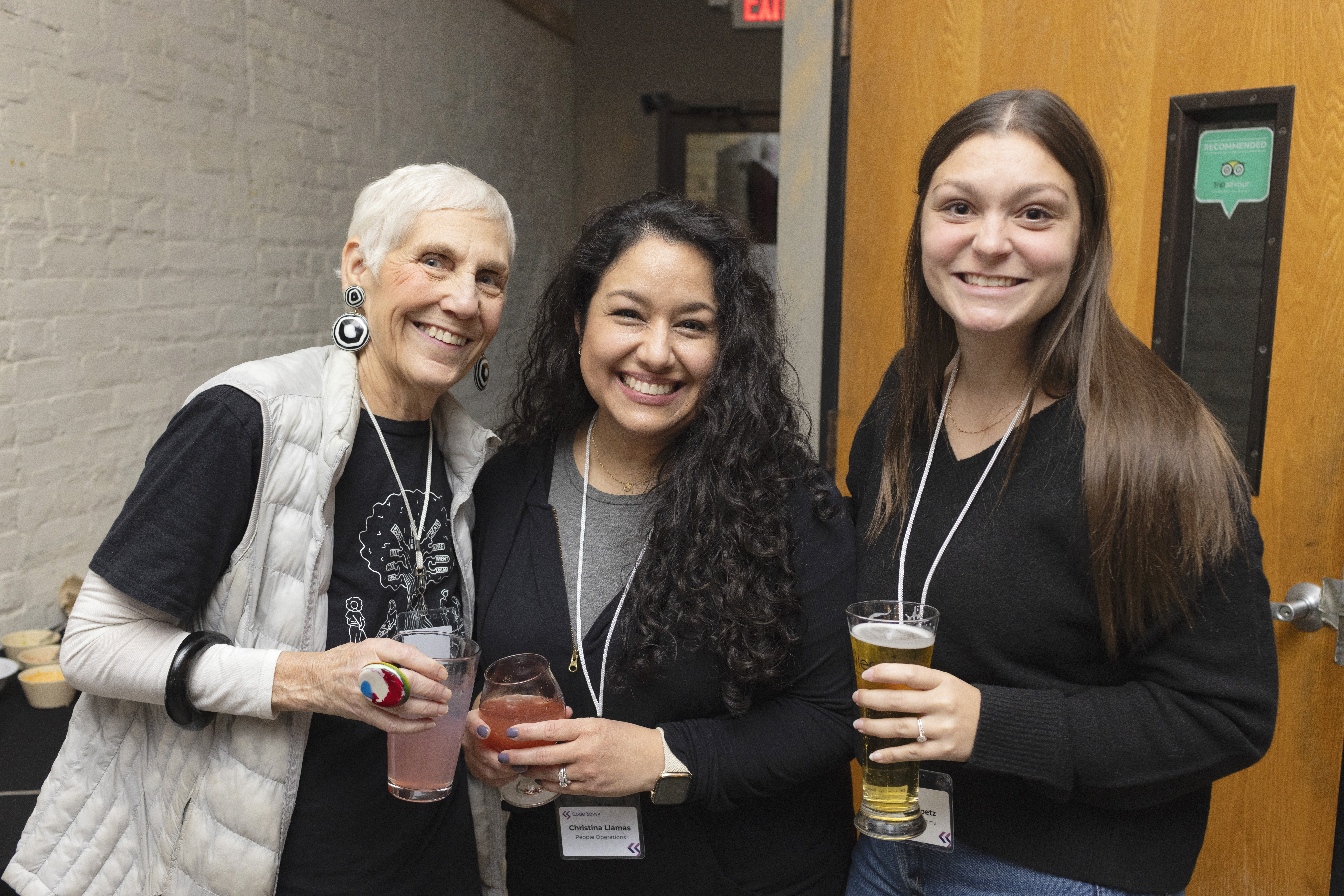 Code Savvy staff members at open house