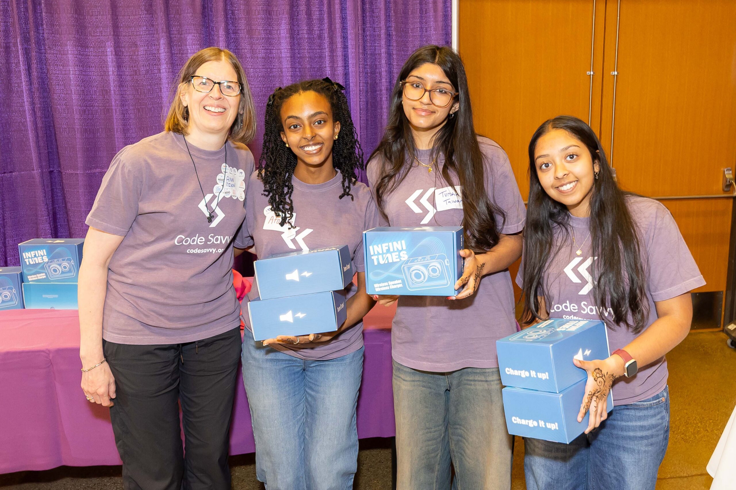 Technovation Girls Minnesota team members posing with awards